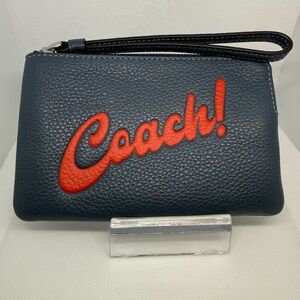 Coach Blue Wristlet with Vibrant Red Logo
